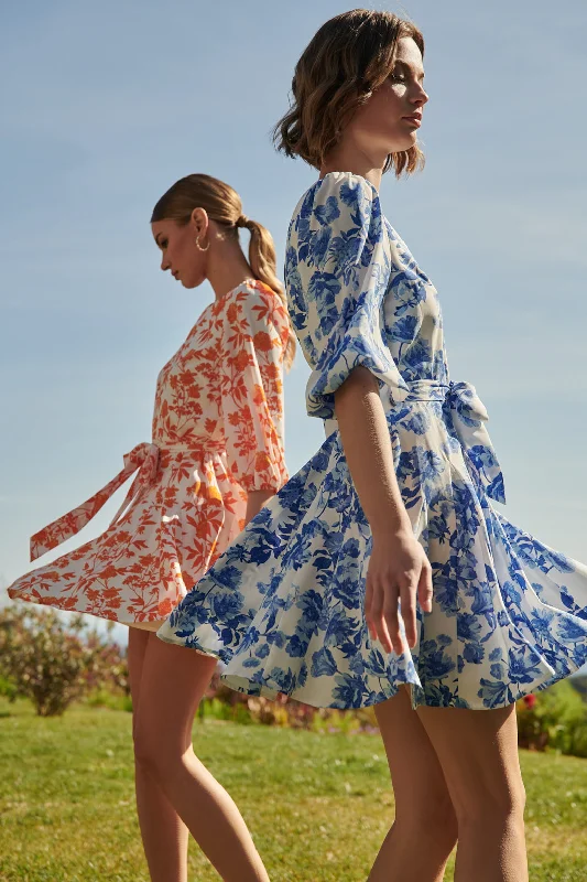 Formal dresses with abstract print panels and rhinestone embellishments for a unique formal eventAntoinette Blue Floral Collins Godet Mini Dress